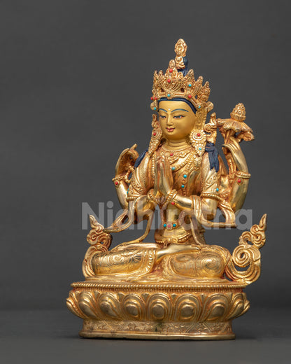 Chenrezig statue face with ornate five jewel crown and intricate Newari metalwork.