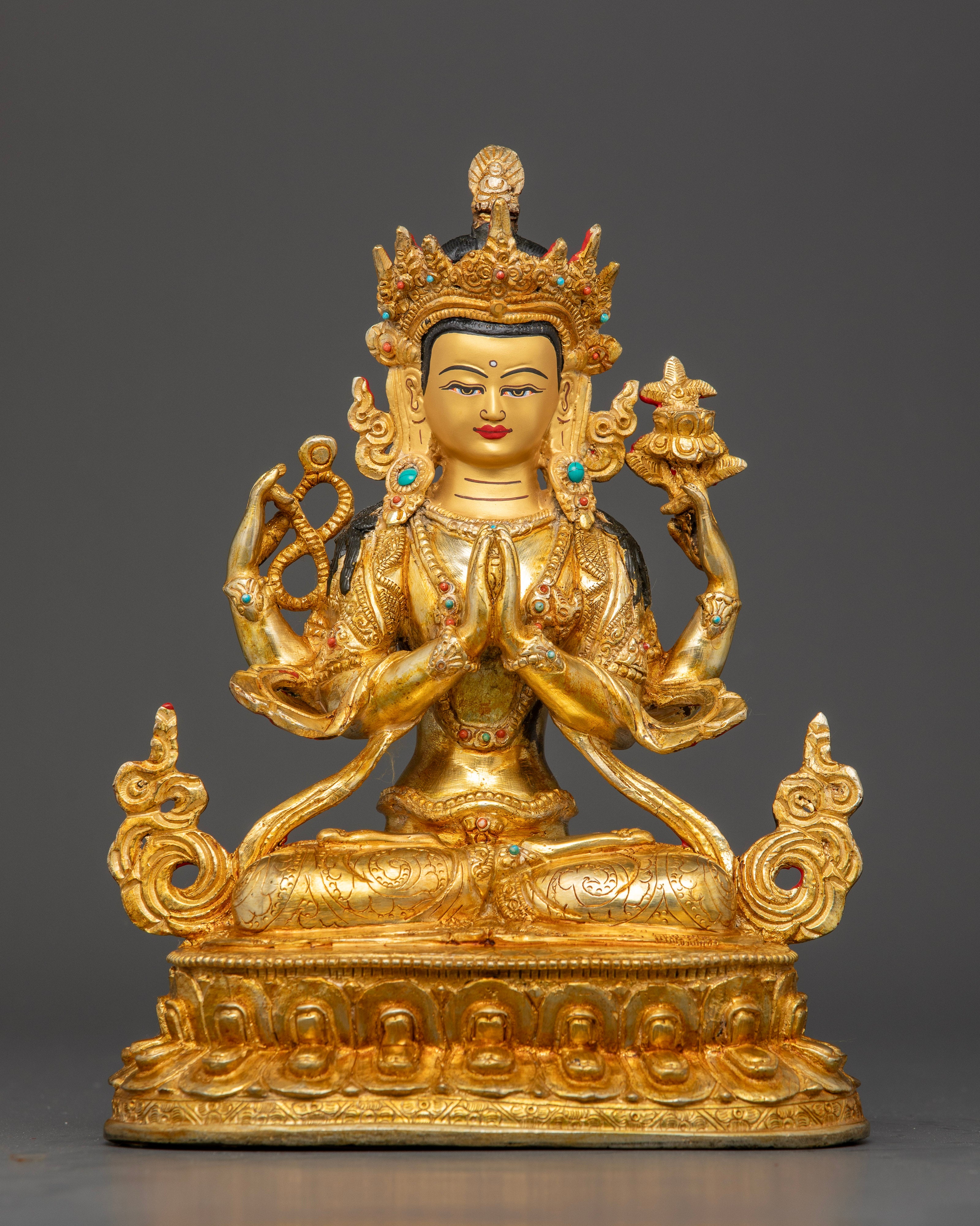 Chenrezig statue from Nepal with 24K gold fire gilding and gold-painted face