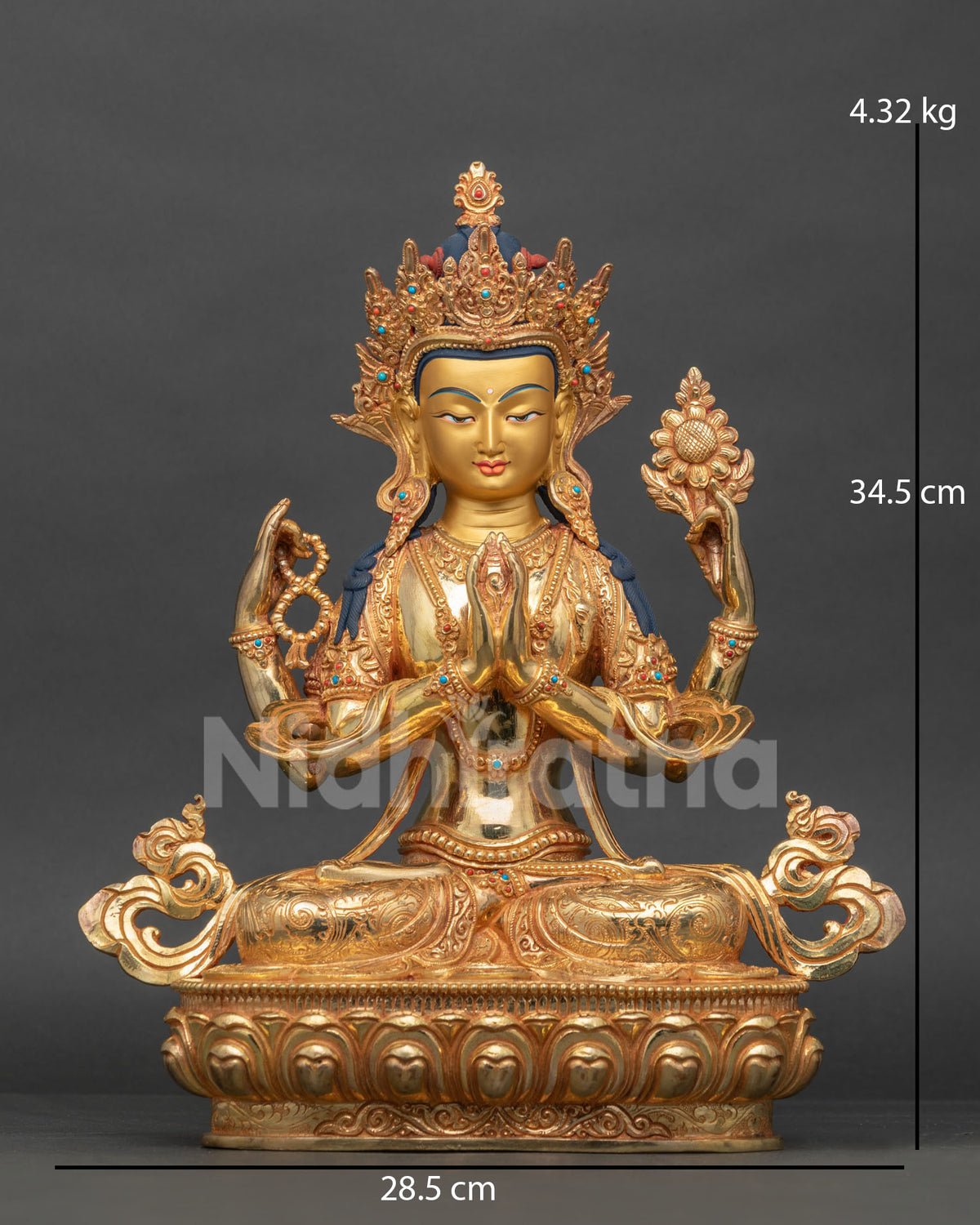 Chenrezig statue handcrafted by newari artist from patan nepal with gold fire gilded finish.