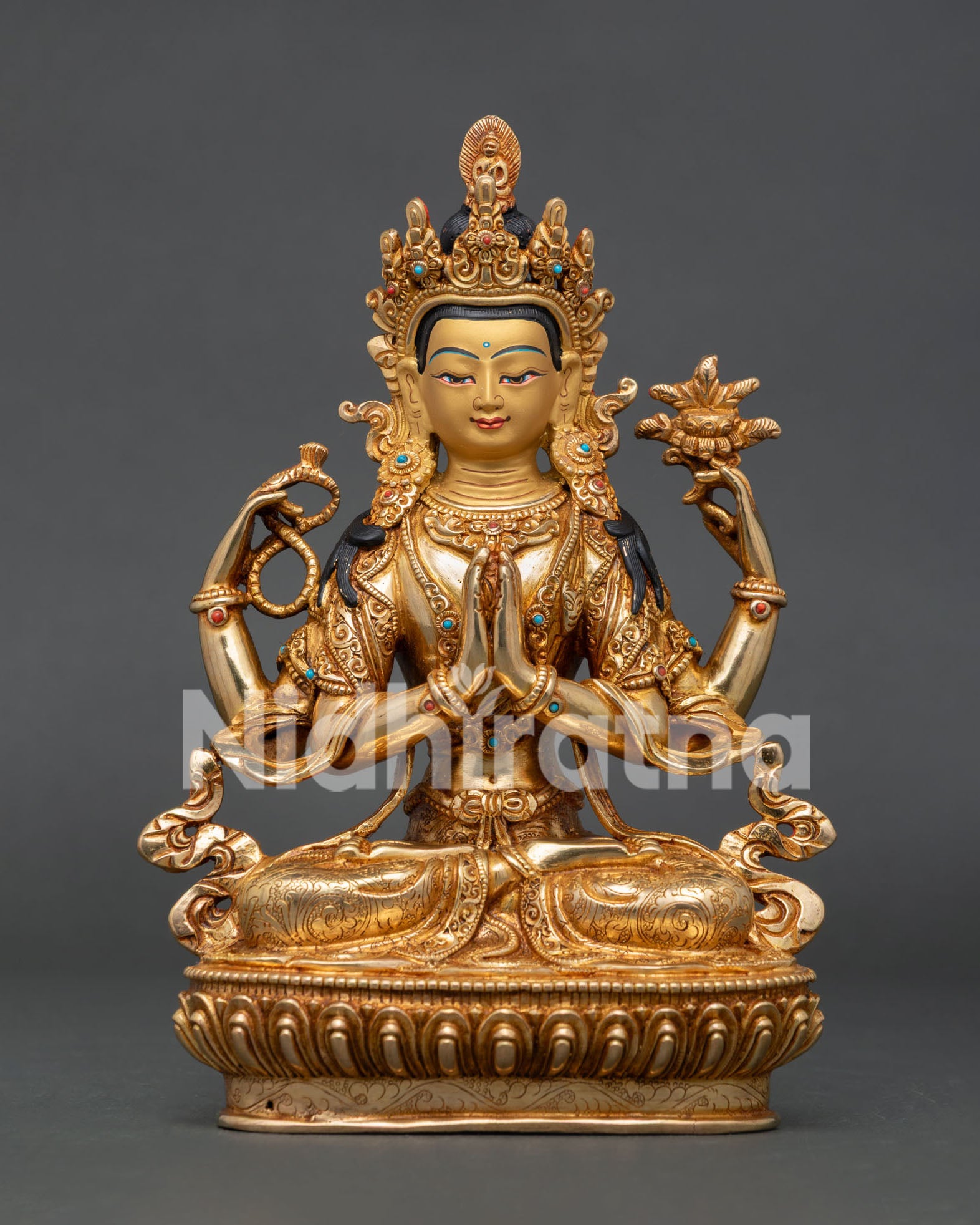 Chenrezig statue handcrafted copper with gold gilded body and semi precious stones from nepal.