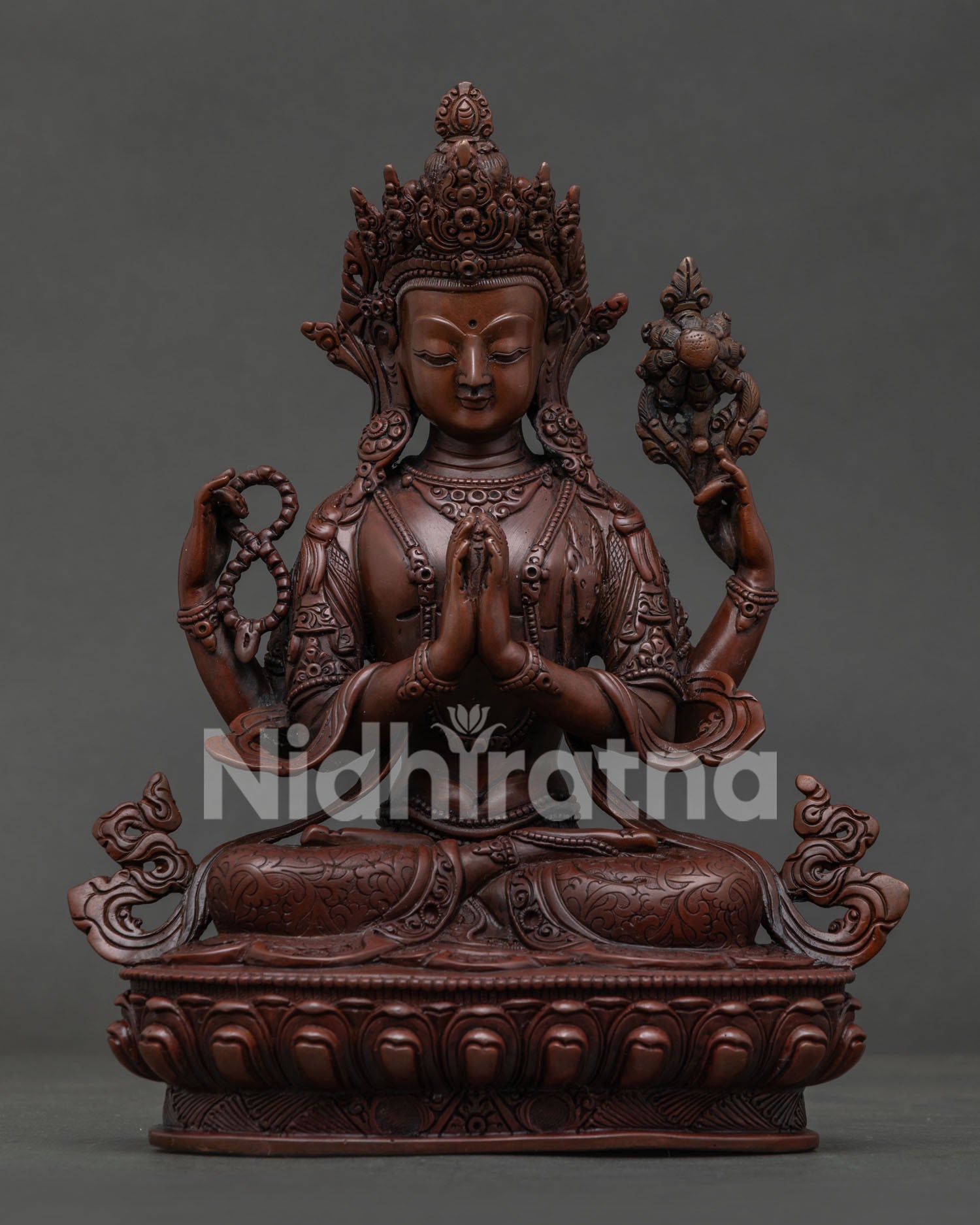 Chenrezig Statue Handcrafted in Nepal with Oxidized Copper Finish.