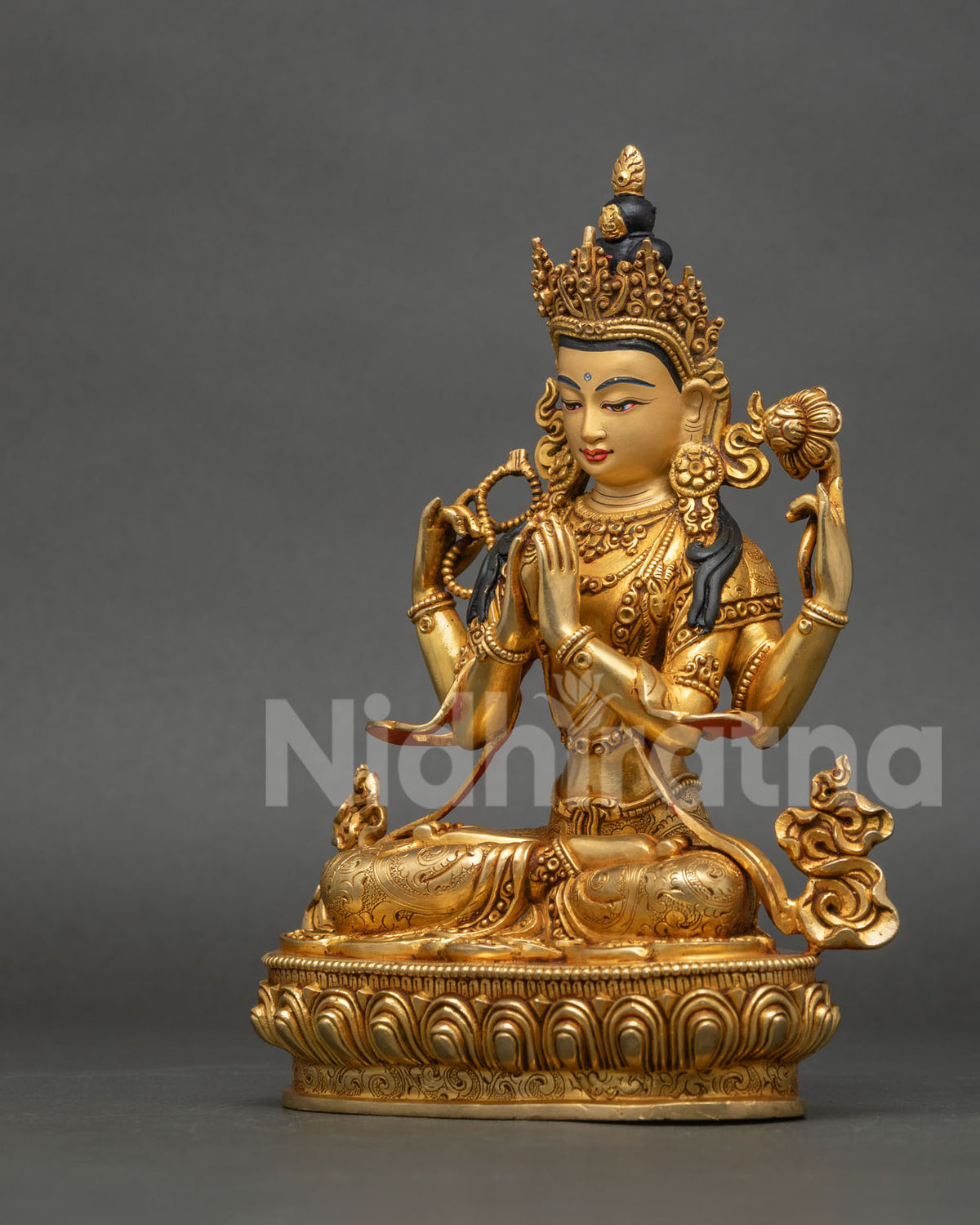Chenrezig Statue left side view five jewel crown layered necklaces lotus pedestal.