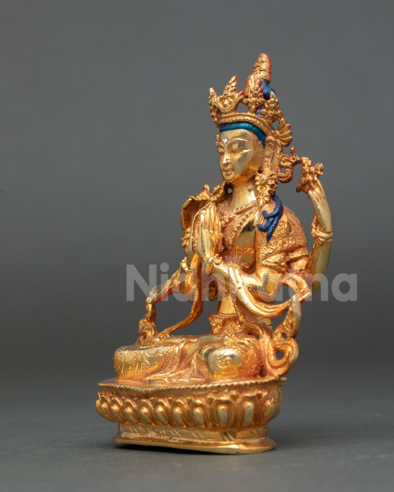Chenrezig statue left side view Himalayan Avalokiteshvara copper gold gilded Buddhist art