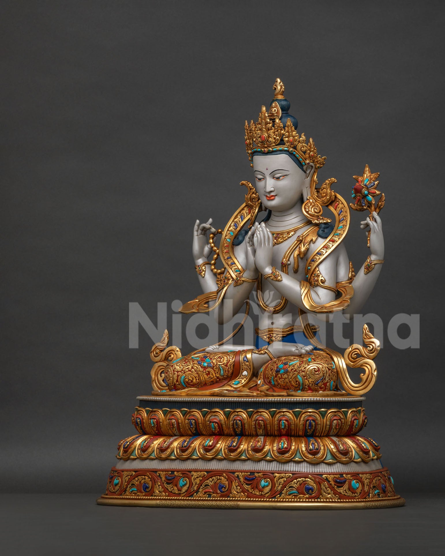 Chenrezig statue Gangwon left side view showing hand chased details, gold gilding and semi precious stones