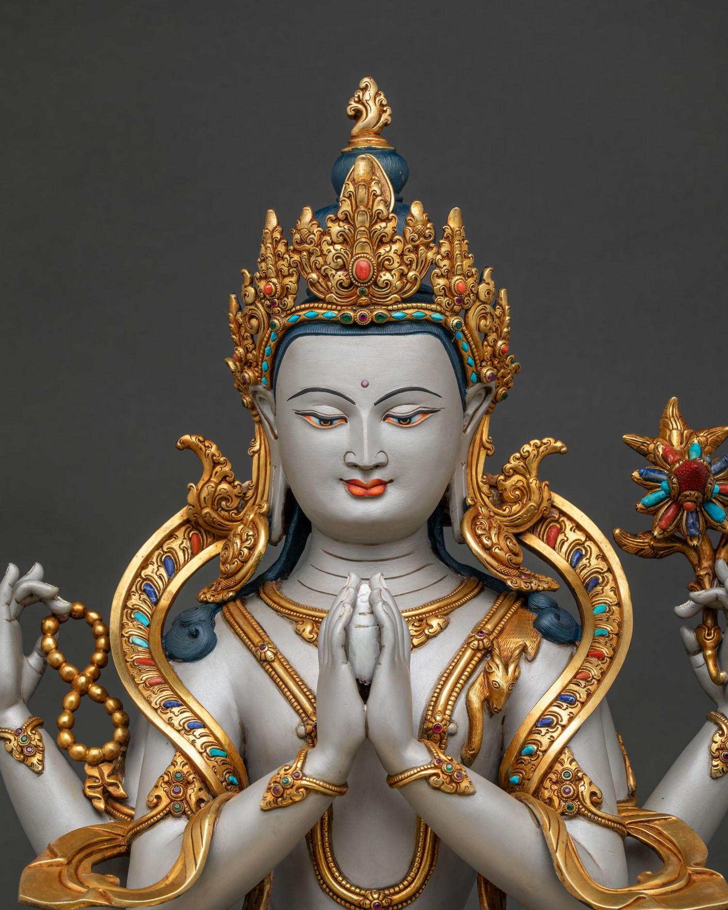 Chenrezig statue Daegu, Buddhist sculpture regular close up with gold gilded details
