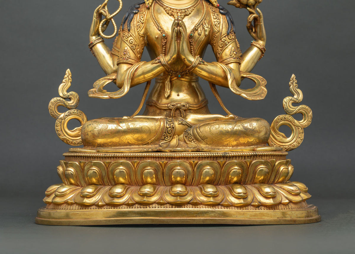 Chenrezig statue seated on tiered double lotus pedestal with flowing scarves, gold fire-gilded copper