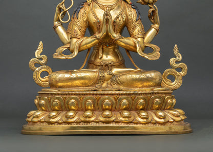 Chenrezig statue seated on tiered double lotus pedestal with flowing scarves, gold fire-gilded copper
