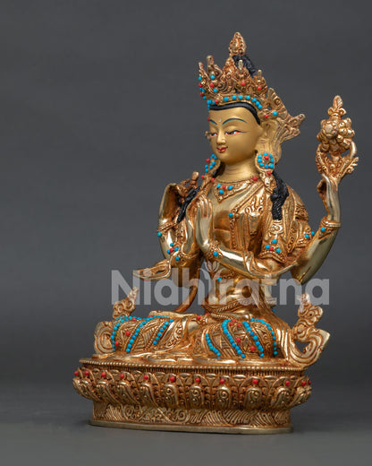 Chenrezig statue with Anjali Mudra, a wish-fulfilling jewel mala, and a lotus flower.