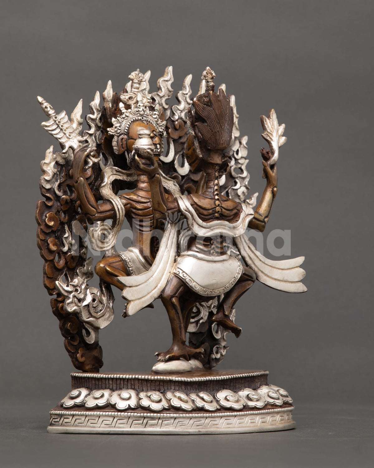 Citipati Statue right side view dancing pair on lotus pedestal.