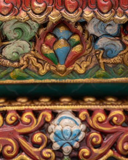 close detail of hand-painted acrylic accents on copper incense holder with gold gilded surface