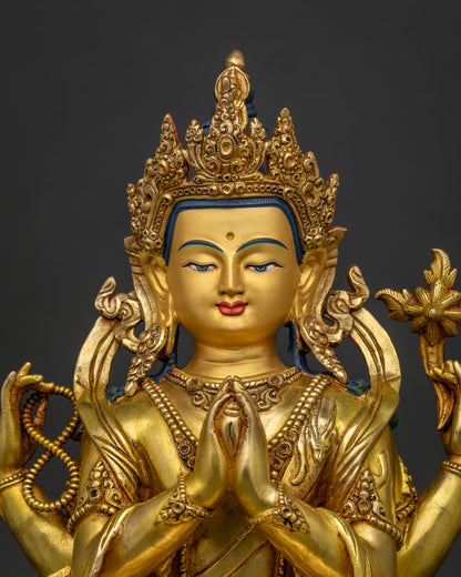Close-Up of 24K Gold 4-Armed Chenrezig Statue with Anjali Mudra and Lotus