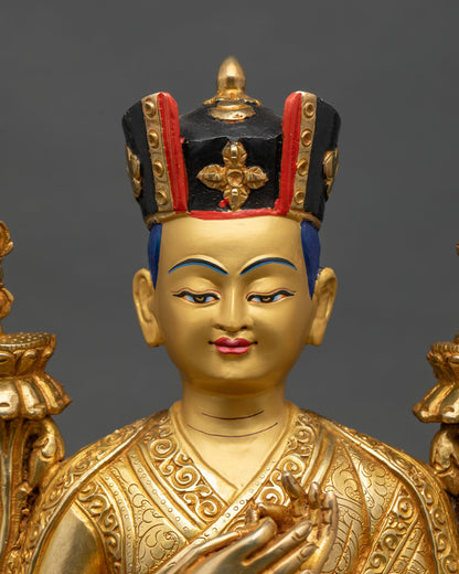 Close-up of 3rd Karmapa statue showing gold gilding and intricate robe details