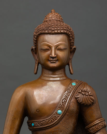 Close up view of Amitabha Buddha face with gently closed eyes and radiant halo showing detailed Himalayan craftsmanship