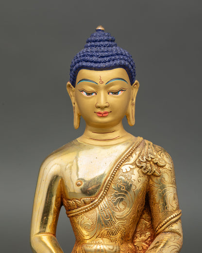 Close up Amitabha Buddha face gold painted serene expression with meditative features