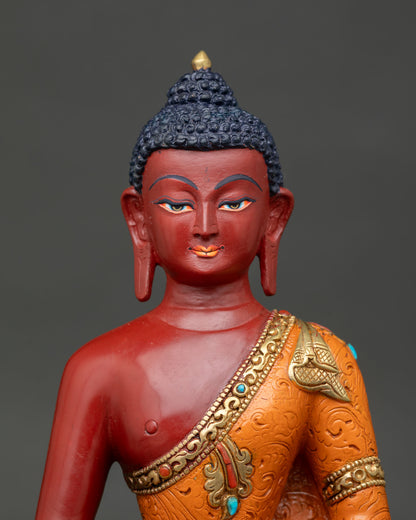 Close-up Amitabha Buddha face showing serene expression and hand-painted details