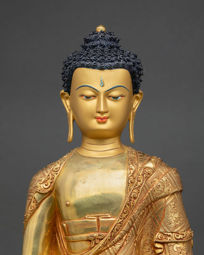Close up Amitabha Buddha face with hand painted gold detail