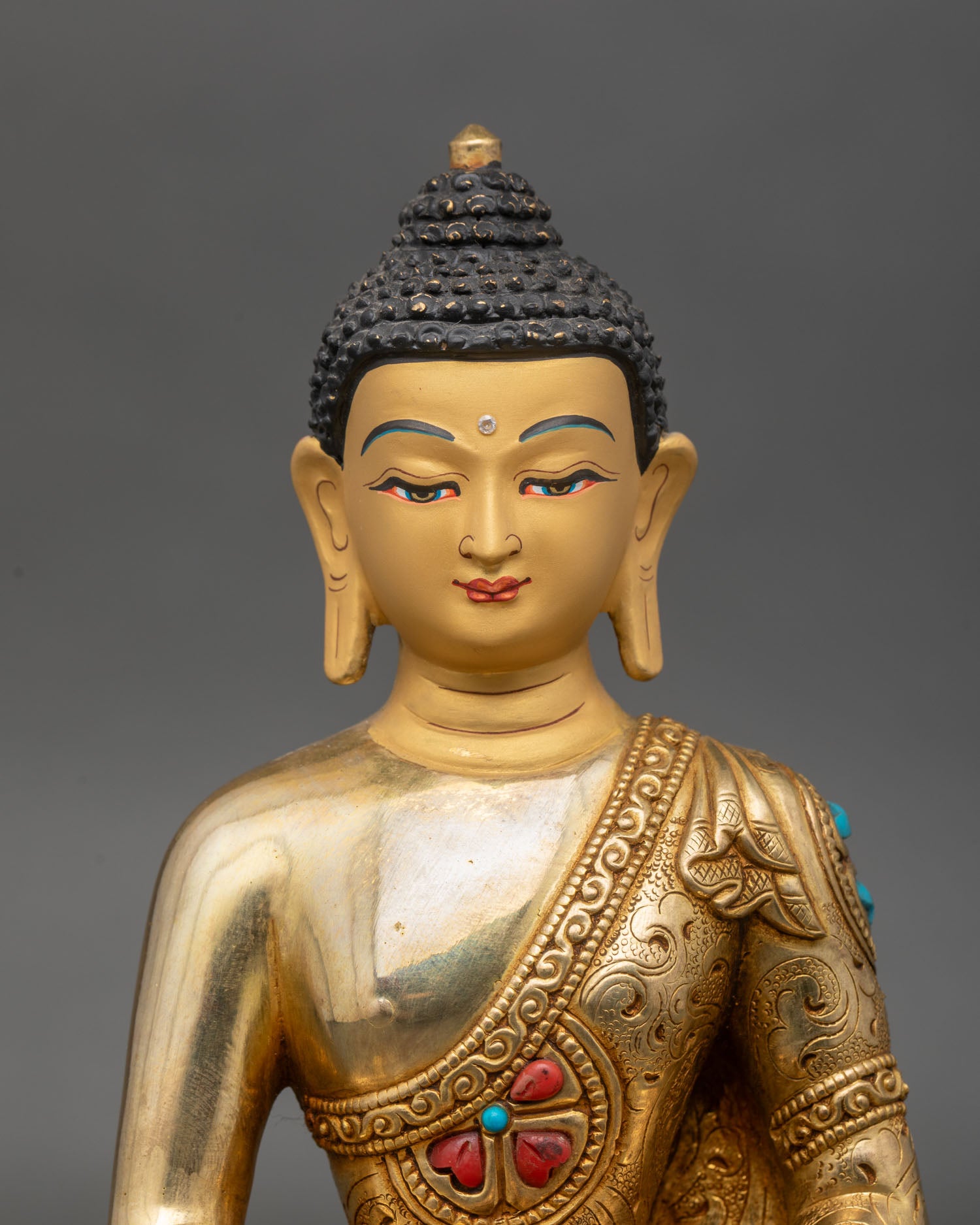 Close up Amitabha Buddha, gold-painted face, Dhyana Mudra, semi-precious stones