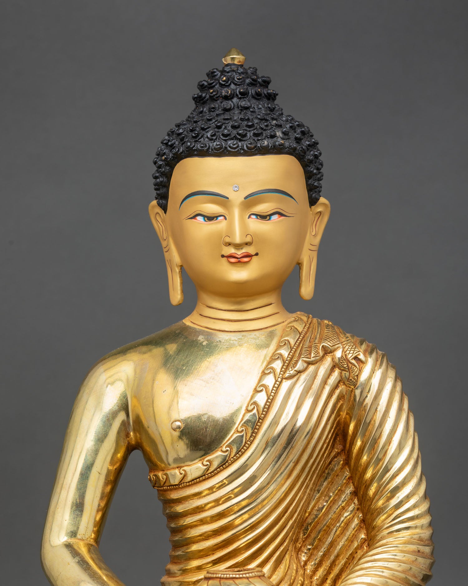 Close up Amitabha Buddha gold painted face semi precious stones floral halo