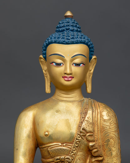 Close up Amitabha Buddha sculpture detail gold painted face hand engraved floral scroll robes copper craftsmanship Buddha of infinite light
