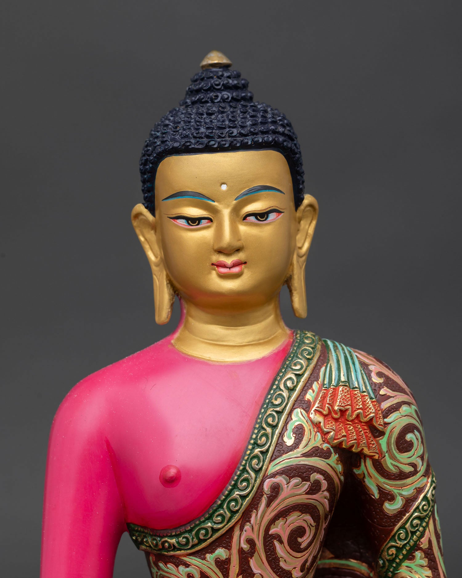Close up Amitabha Buddha serene face with gold detailing hand painted finish symbolizing infinite light compassion and spiritual awakening