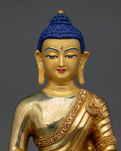 Close up Amitabha Buddha, serene gold painted face detail, copper statue with 24K gold gilding, Himalayan Buddhist craftsmanship