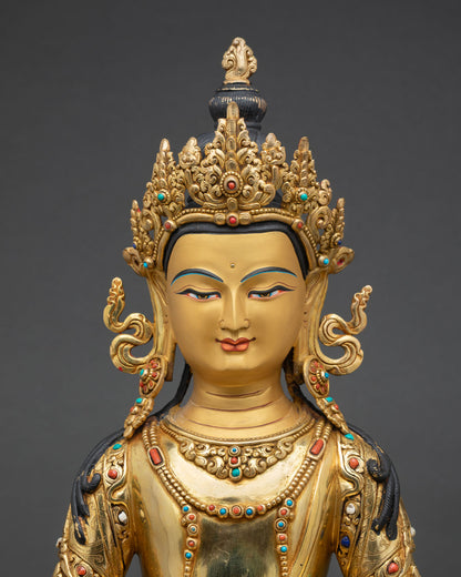 Close up Amitayus face detail gold painted finish semi precious stone inlay Himalayan Buddhist statue, spiritual craftsmanship Nepal