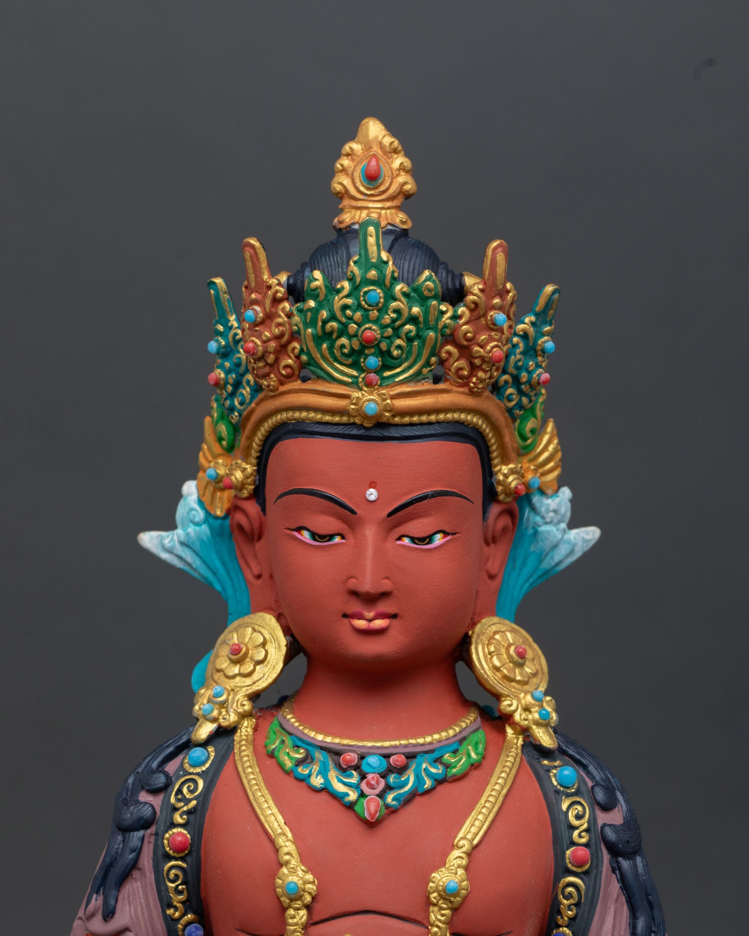 Close-up Amitayus face with serene expression, gold details, and Newari craftsmanship