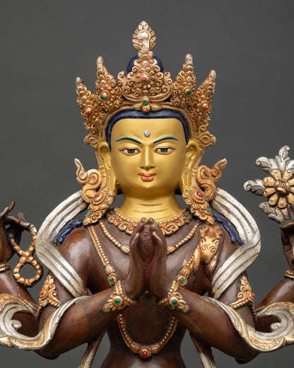 Close up Chenrezig face detail serene expression with semi precious stones traditional Newari craftsmanship from Patan Nepal Buddhist sculpture