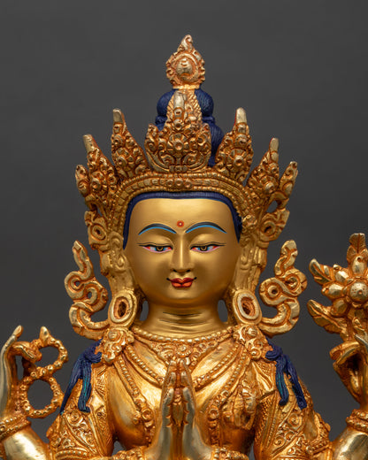 Close up of Chenrezig face serene expression gold painted crown lotus pedestal sculpture
