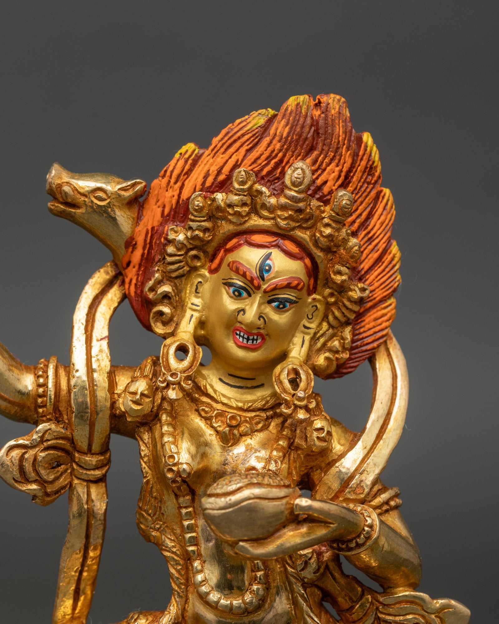 Close up Dorje Phagmo face skull garland handcrafted Himalayan Buddhist sculpture
