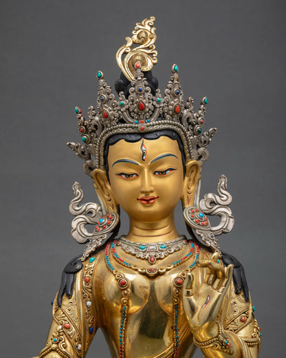 Close up Dukar statue gold painted face semi precious stones intricate Himalayan Newari craftsmanship lost wax casting detail