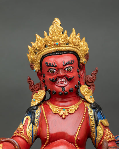 Close-up Dzambhala face detail with gold gilded finish, acrylic painting, Himalayan artisan craftsmanship, sacred Buddhist wealth deity expression