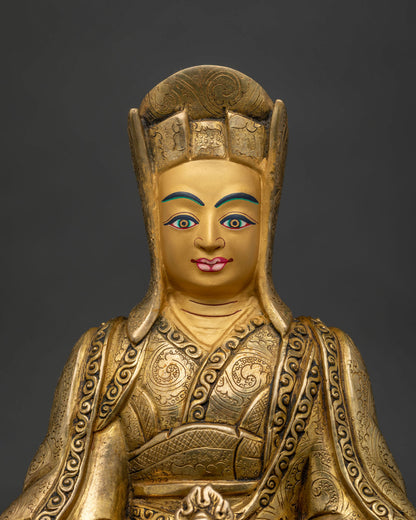 close up gampopa statue monastic robes hand chased detail kagyu lineage master