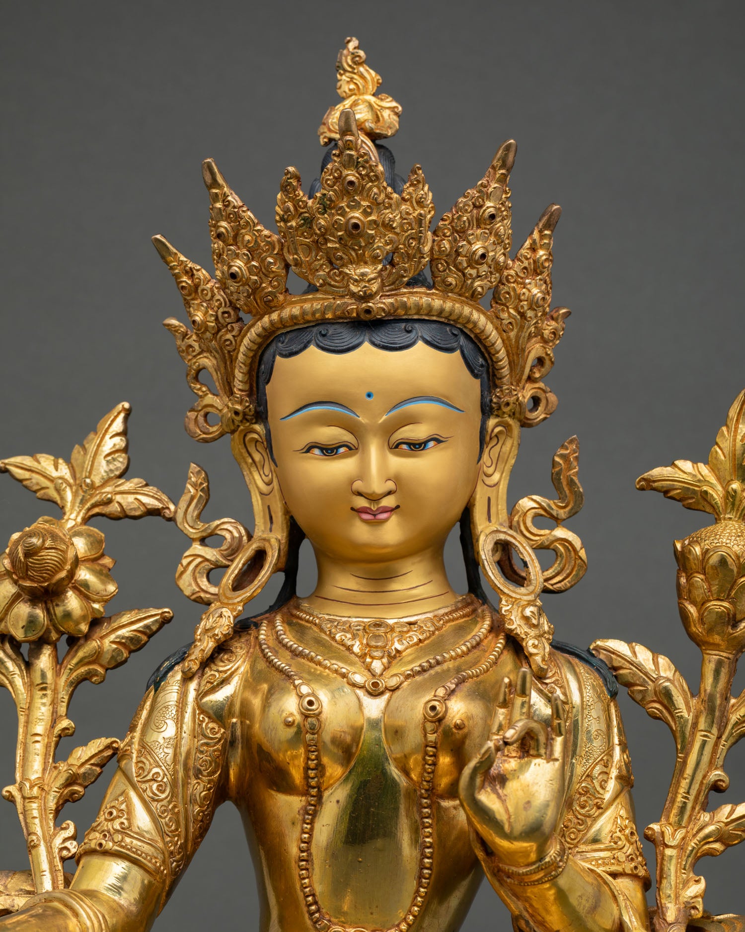 Close Up Green Tara Gold Painted Face Detail Copper Statue with Repousse Hand Chased Floral Engravings Nepalese Buddhist Himalayan Craftsmanship