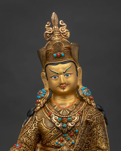 Close Up Guru Rinpoche Statue Gold Painted Face with Semi Precious Stones.