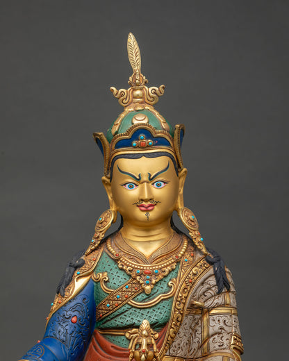 Close Up of Guru Rinpoche Statue Showing Hand-Painted Detail and Gold Gilding