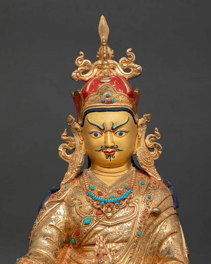 close up guru rinpoche statue intricate copper details 24k gold gilding nepal handcrafted sculpture