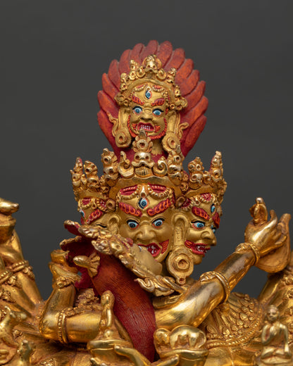 Close up Hevajra statue gold face detailed expressions multiple faces arms intricate craftsmanship lost wax casting Nepal Buddhist deity