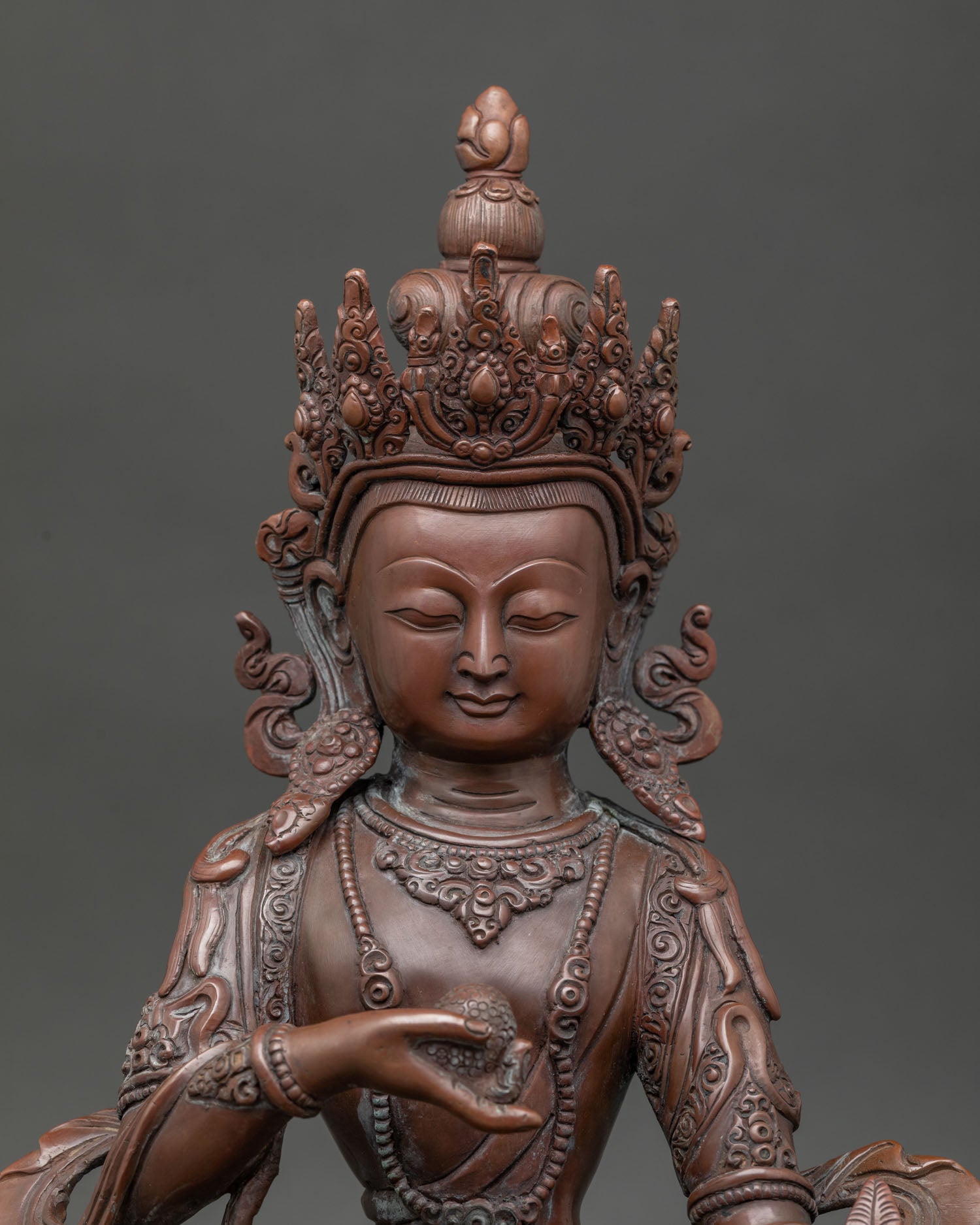 Close Up Kshitigarbha Statue Five Jewel Crown Royal Garment Intricate Details.