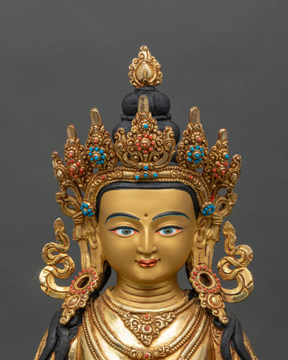 regular close-up ksitigarbha statue showing intricate copper and gold details