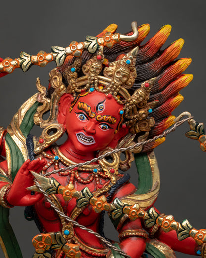 Close up Kurukulla statue detailed view showing four arms, adorned with semi precious stones and rich acrylic colors Himalayan Buddhist spiritual art
