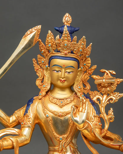 Close up Maha Manjushri head four arms sword utpala Prajnaparamita sutra detail