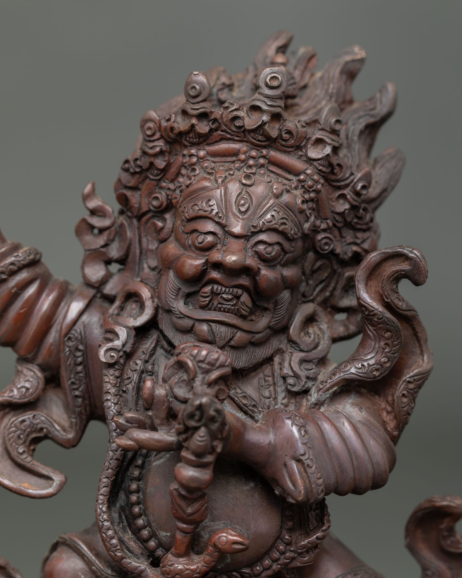 Close up Mahakala Bernagchen Buddhist protector statue, fierce expression detailed