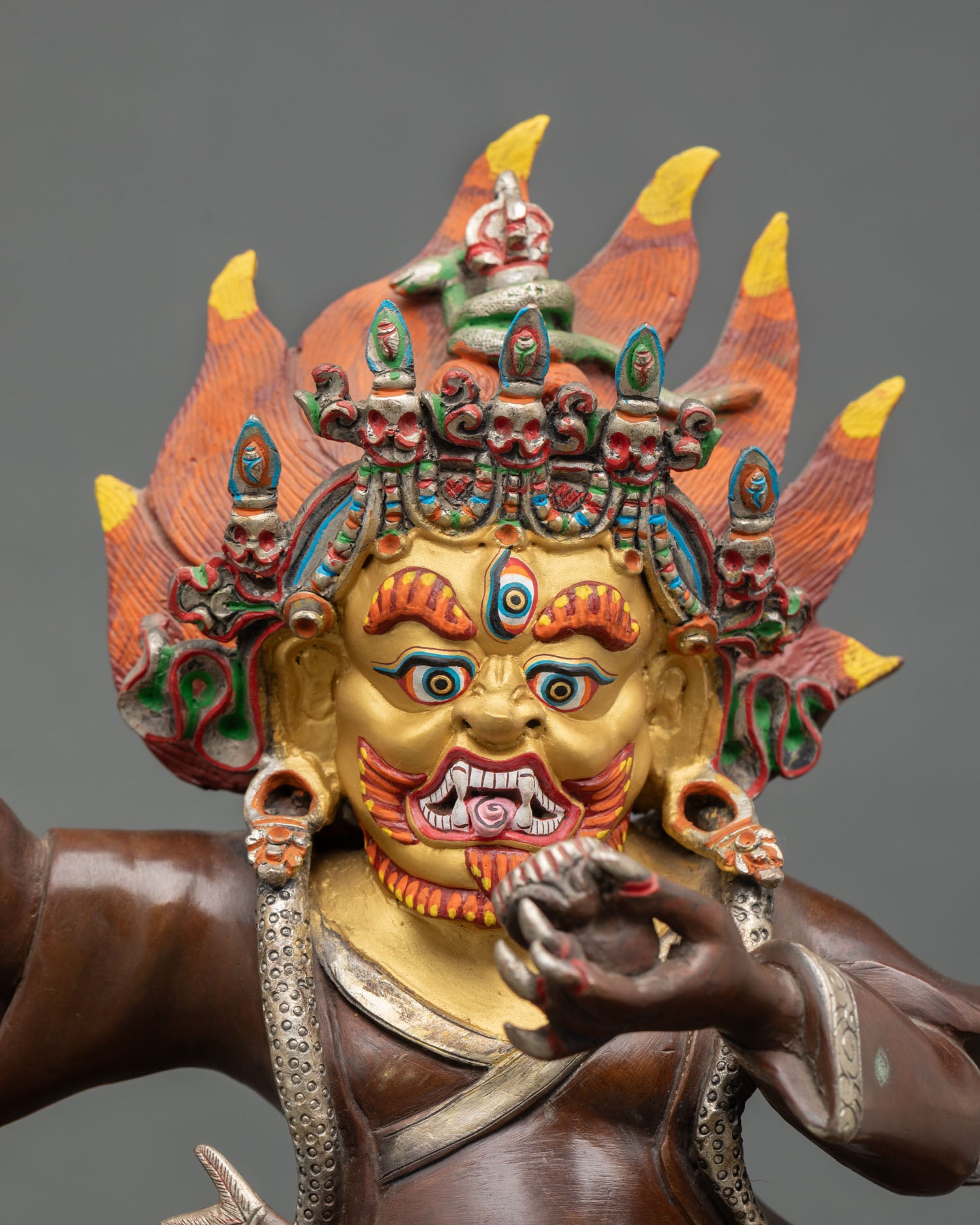 Close up Mahakala Bernagchen fierce expression detail, kapala symbolic Vajrayana Dharma protector statue