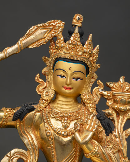 Close Up Manjushri Face Gold Painted Expression Himalayan Buddhist Wisdom Deity