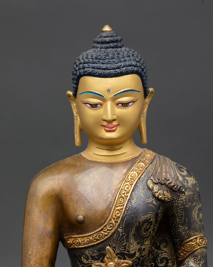 Close up Medicine Buddha face serene expression gold plated handmade Nepal
