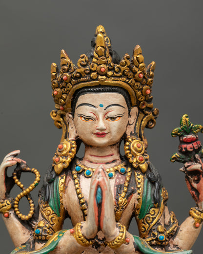 close up mini chenrezig statue copper handcrafted buddhist art with acrylic colors and stone inlay