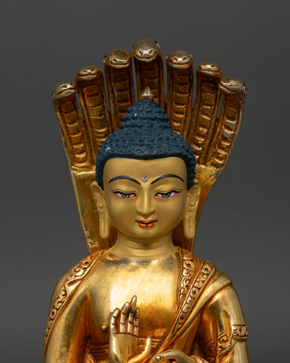 close up nagarjuna face detail naga halo coiled serpent radiant gold buddhist sculpture