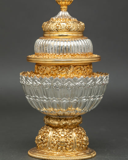 close up neshi rice pot detail floral motifs ornamental carving sacred buddhist altar vessel handcrafted nepal