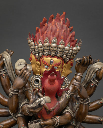 Close-up of 14-Armed Mahakala Yab-Yum oxidized copper statue with semi-precious stone inlay